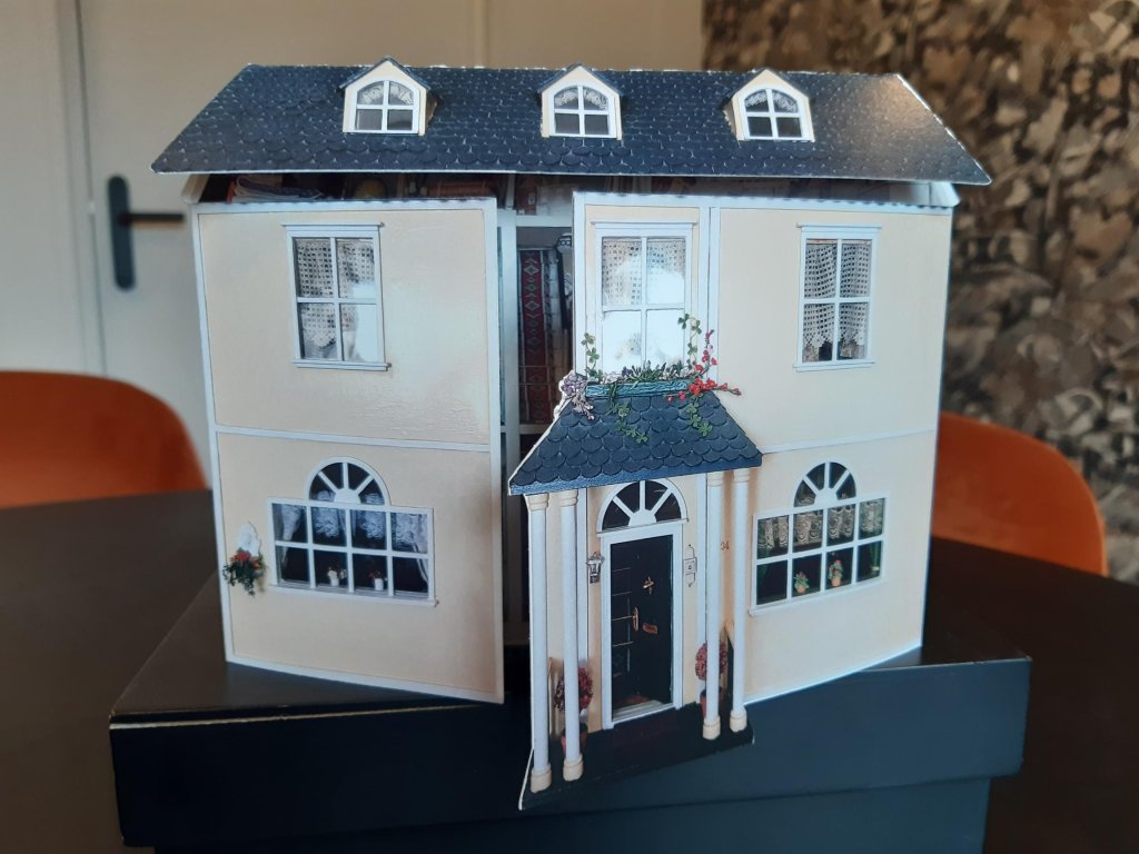 Poppenhuis als bijzondere rouwkaart